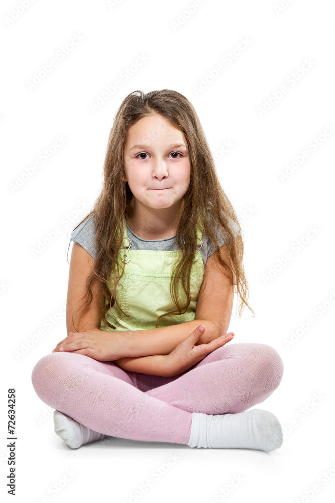 Young girl sitting on floor Young girl sitting on floor