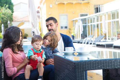 Family close to the pool