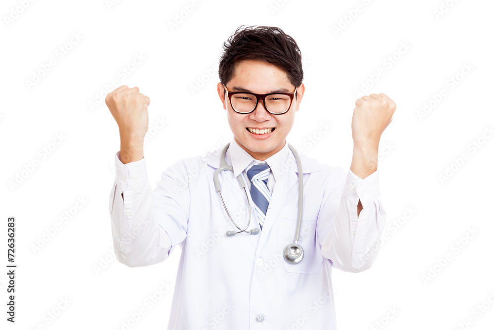 Asian male doctor happy hold both fists up