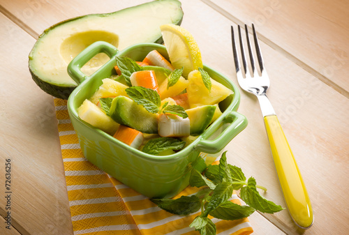 salad with avocado surimi and pineapple