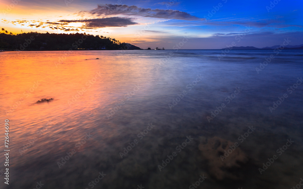 Tropical sea with sunset scene