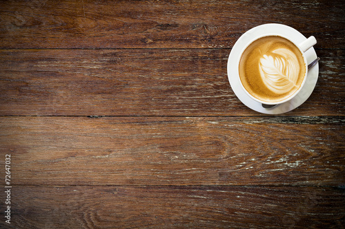 Billede på lærred latte coffee on wood with space.