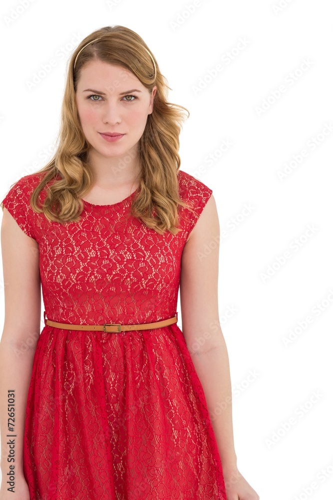 Beautiful woman wearing red dress smiling at camera
