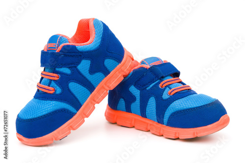 pair of blue sporty shoes for kid on white