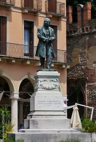 The statue of Fidele Lampertico in Vicenza in Italy photo