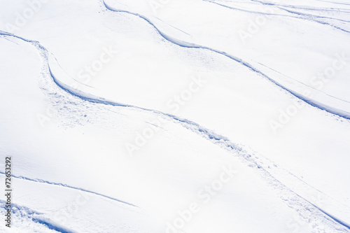 Skiing, snow - freeride tracks on powder snow