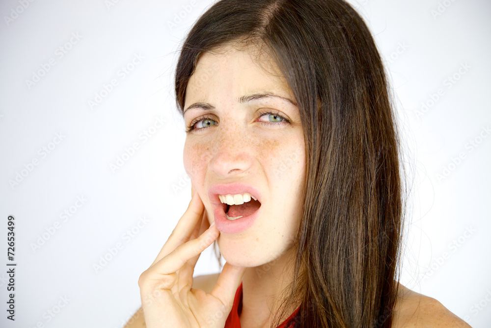 Young woman feeling strong teeth pain Young woman feeling strong teeth pain