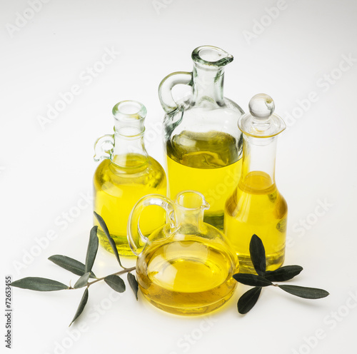 Bottles of olive oil isolated on white background