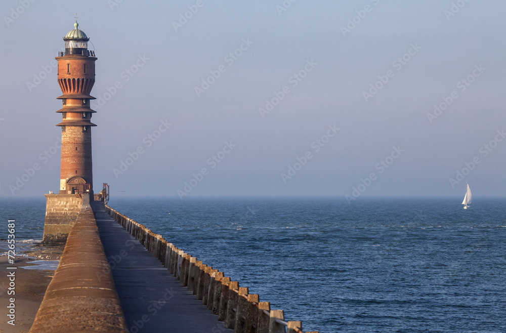Lighthouse and lonely yacht, Dunkerque Lighthouse and lonely yacht, Dunkerque
