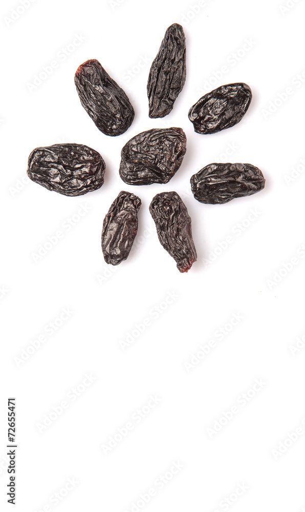 Black raisin over white background Black raisin over white background