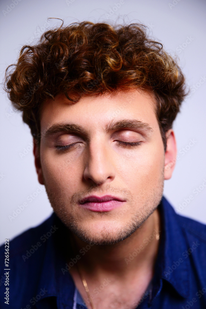 Closeup portrait of a relaxed man with closed eyes Closeup portrait of a relaxed man with closed eyes