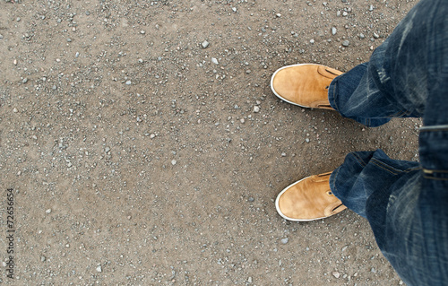 yellow boots on the road
