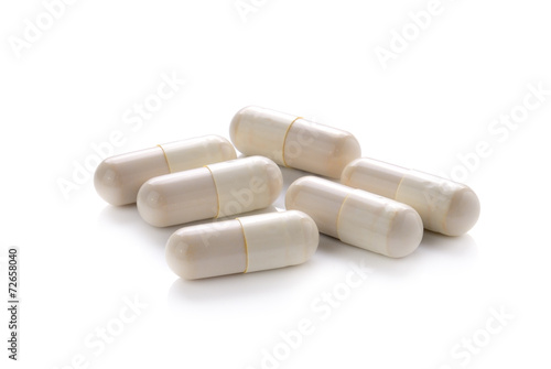 close up of pills capsule isolated on white background