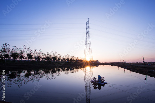 high voltage transmittion tower and landscape photo