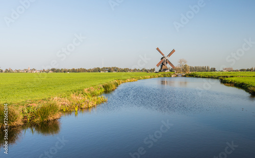 Photo Dutch polder landscape with windmill