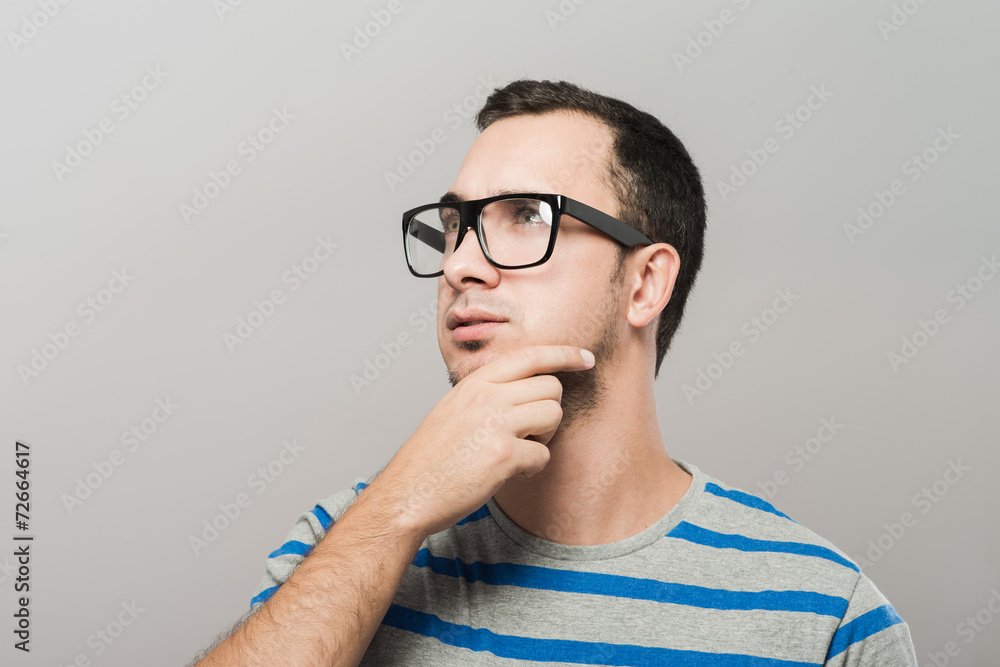 young business man thinking young business man thinking