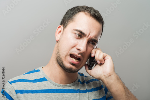 young man talking on the phone