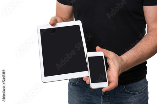 Man showing digital tablet vs smart phone photo