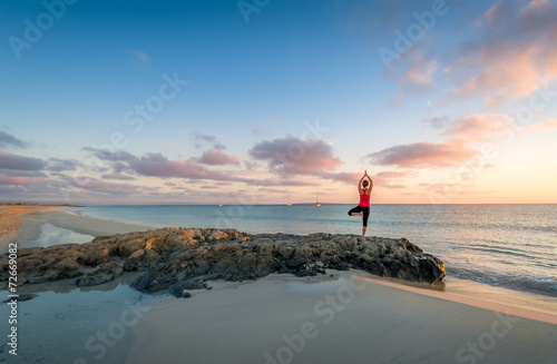 Island beach sunrise and yoga practice