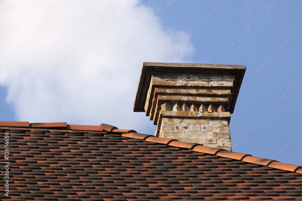 Old chimney on a top of the house
