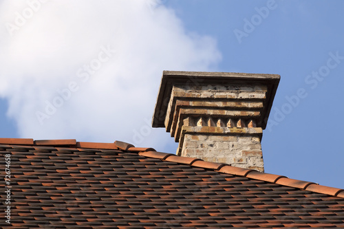 Old chimney on a top of the house