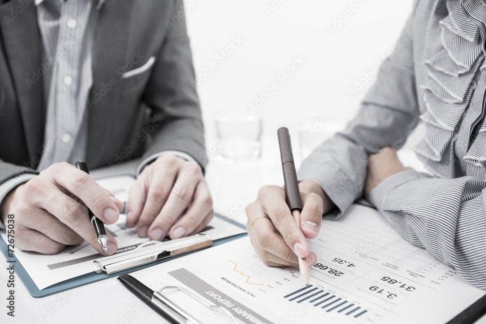 Business people discussing during a meeting Business people discussing during a meeting