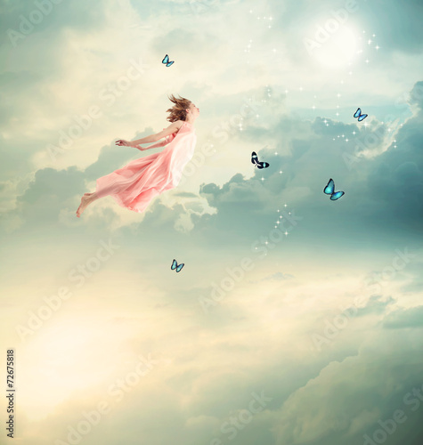 Blonde Girl Flying with Butterflies