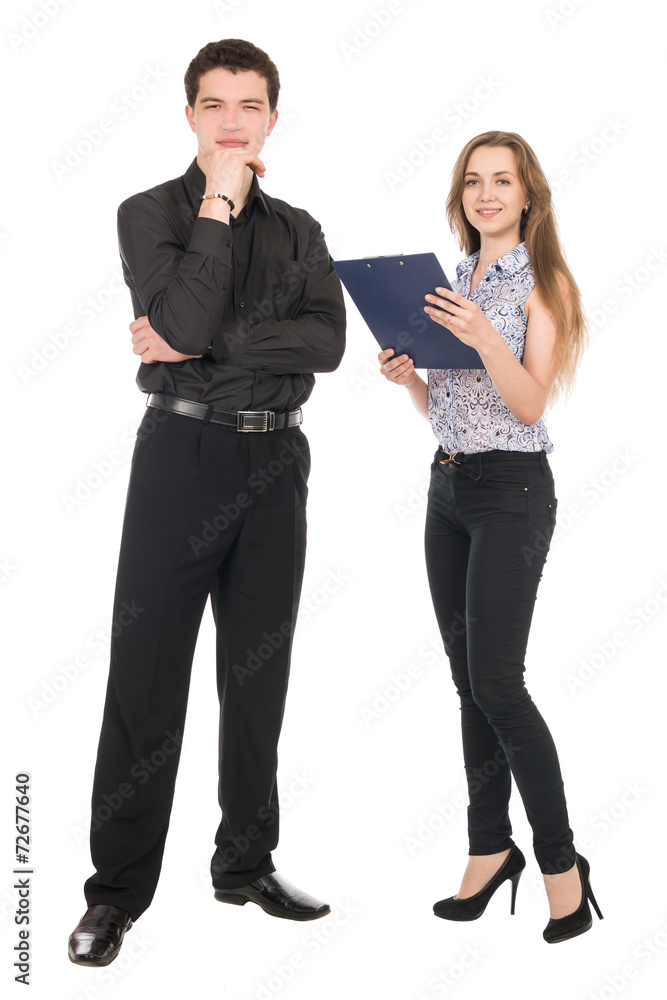 Businesswoman and a businessman standing in full-length Businesswoman and a businessman standing in full-length