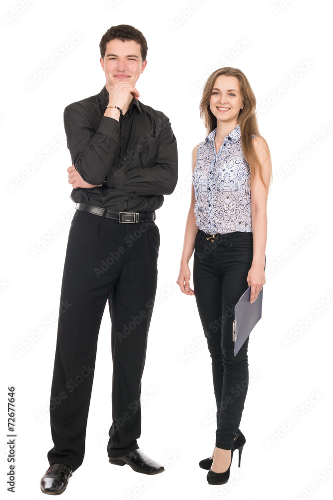 A portrait of a businesswoman and a businessman standing in full A portrait of a businesswoman and a businessman standing in full