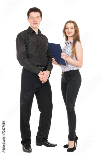 A portrait of a businesswoman and a businessman standing