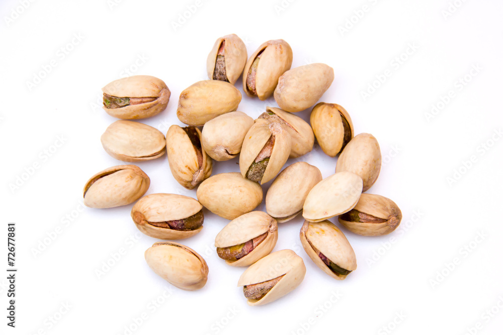 Pistachios on a white background seen from above