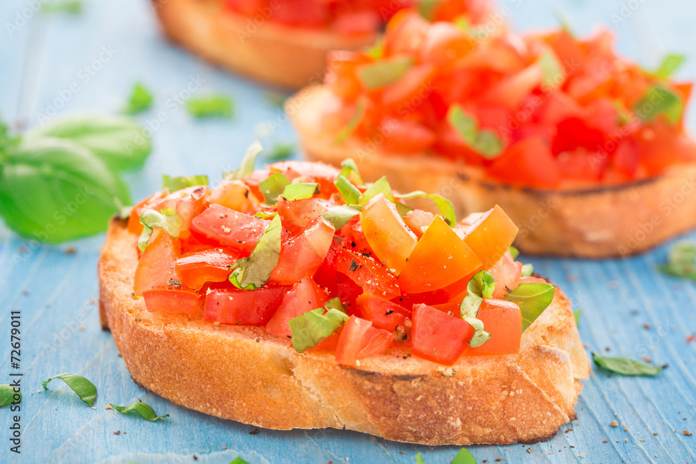 Italian tomato bruschetta with basil Italian tomato bruschetta with basil
