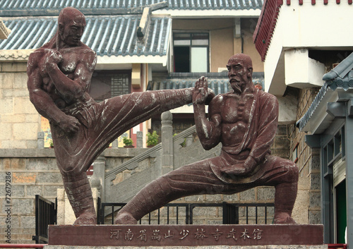 statue of two fighters near Shaolin temple