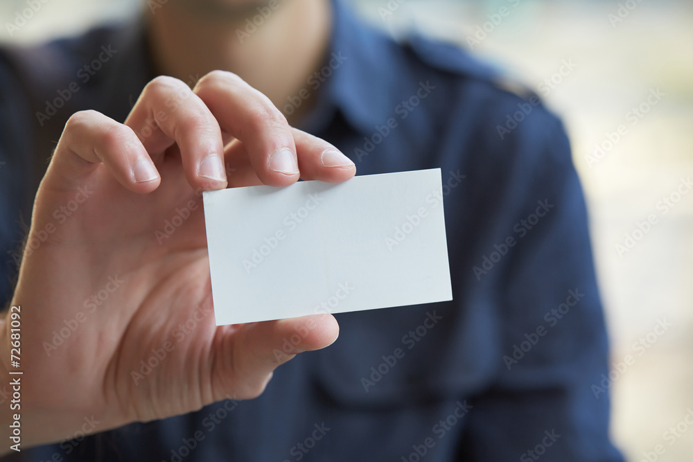 businessman giving a business card businessman giving a business card