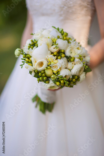 Beautiful wedding bouquet in bride s hand