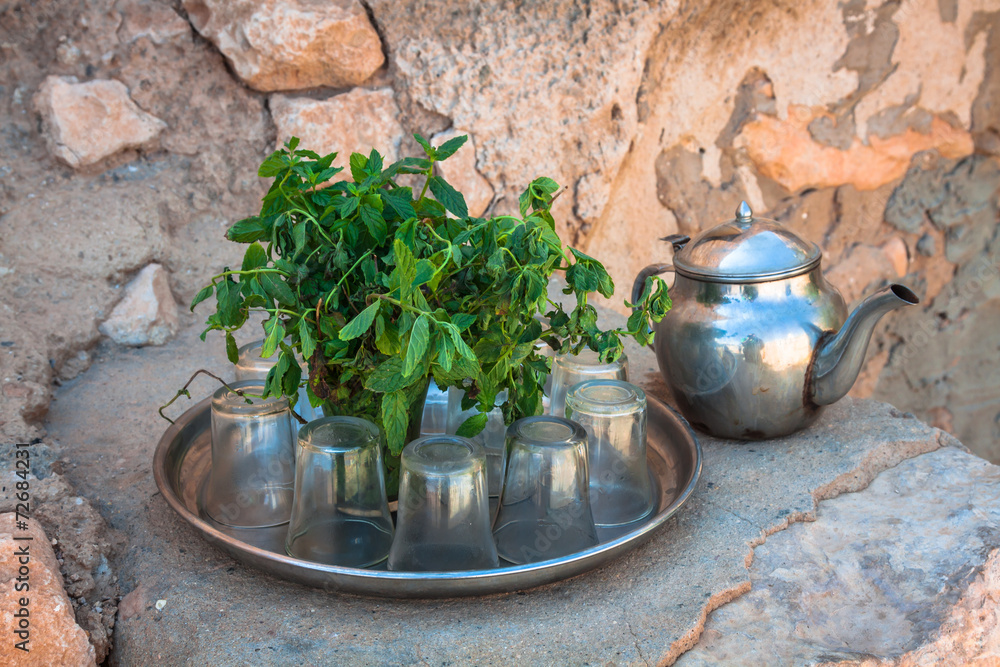 Mint tea: a kettle and a glass