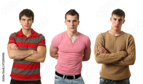 Three young sexy men isolated on white