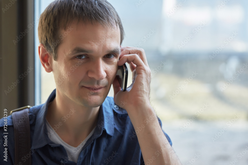 Businessman talking on a mobile phone Businessman talking on a mobile phone