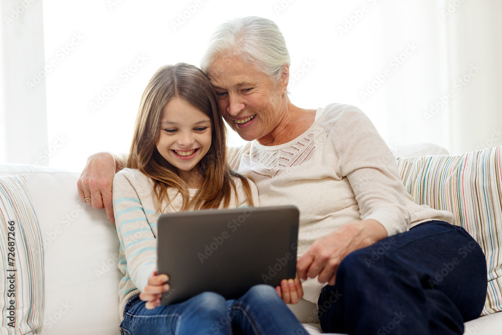 smiling family with tablet pc at home smiling family with tablet pc at home