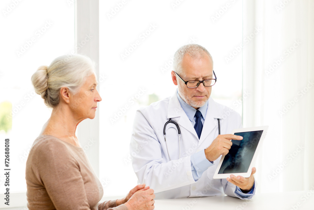 senior woman and doctor with tablet pc senior woman and doctor with tablet pc