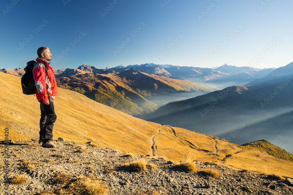 Hiker resting on the mountain top