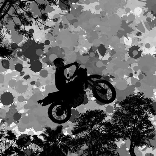 Jumping motorcycle rider