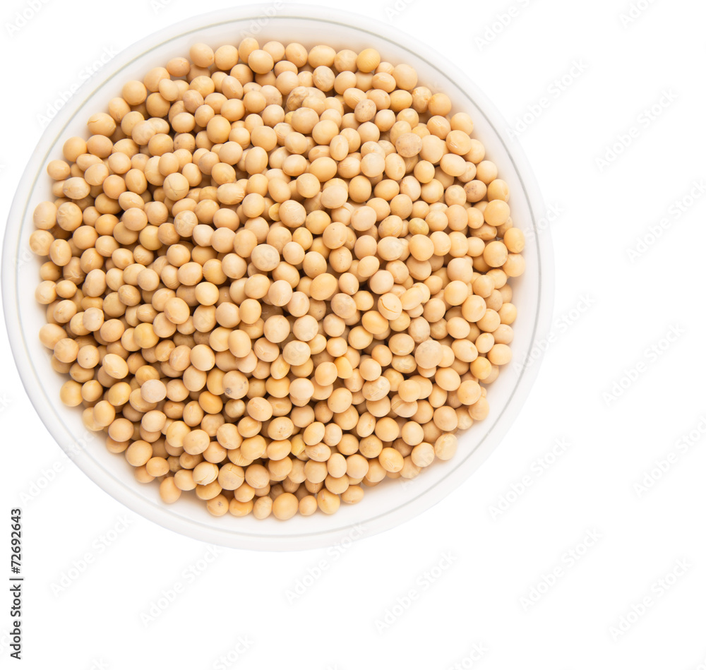 Soybean in a white bowl over white background Soybean in a white bowl over white background