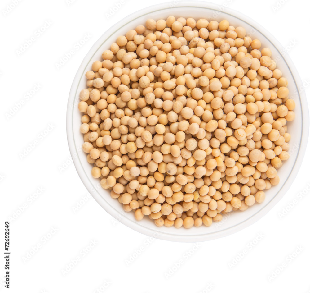 Soybean in a white bowl over white background Soybean in a white bowl over white background
