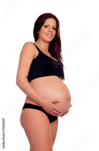 Brunette pregnant woman in underwear