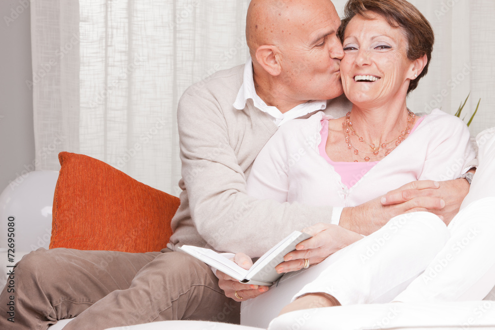 mature couple loving each other at home mature couple loving each other at home