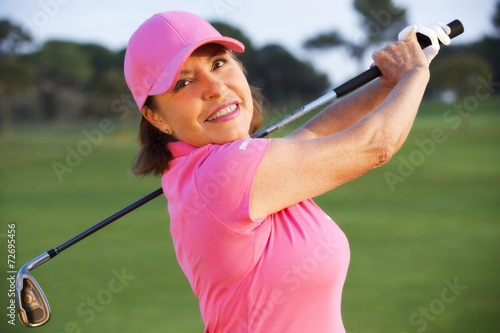 beautiful senior female golf player