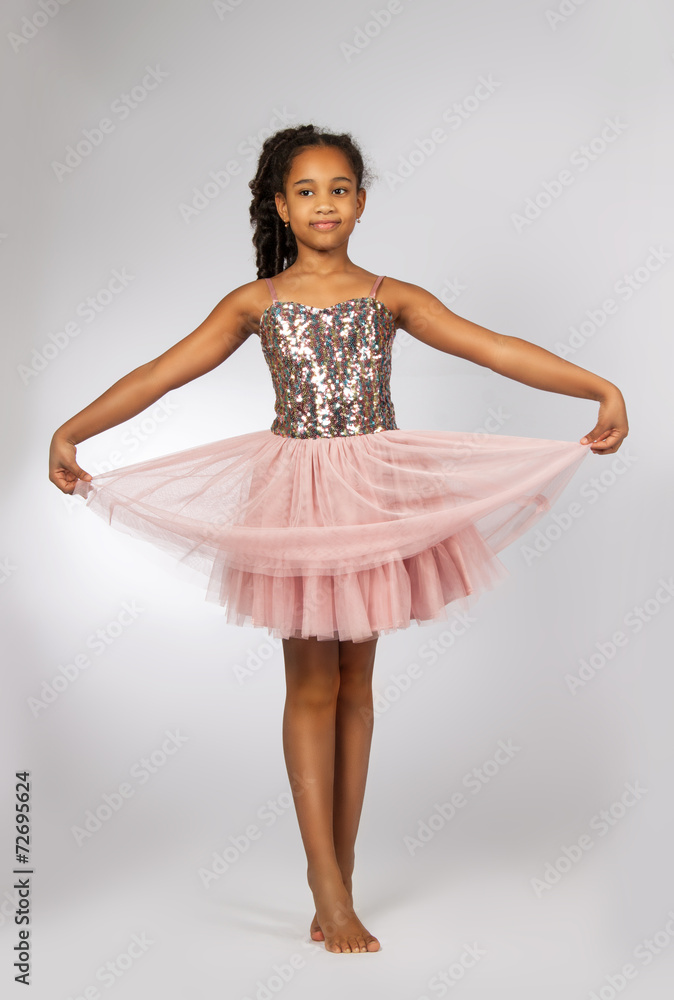 Naklejka premium Beautiful little girl dancing