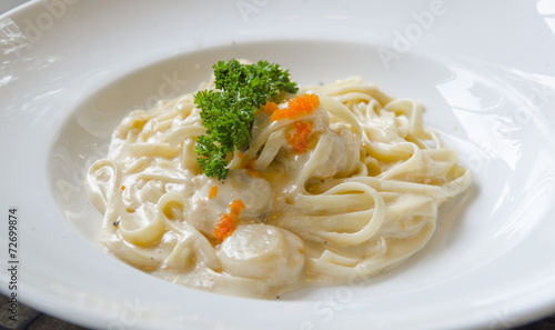 Spaghetti with shrimp&egg shrimp in white dish on the stone table
