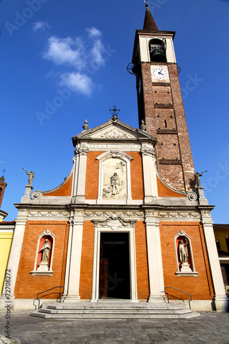 in  the mozzate  old   church  closed brick tower sidewalk italy photo